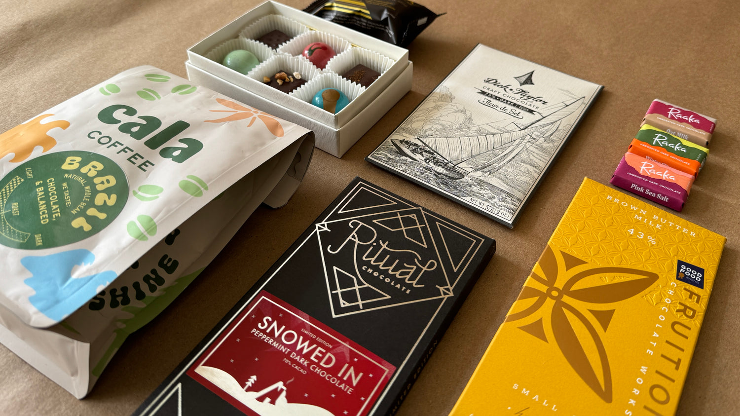 Curated selection of craft chocolate and coffee from makers such as Ritual Chocolate, Fruition Chocolate, Raaka, Dick Taylor Chocolate, Cala Coffee.